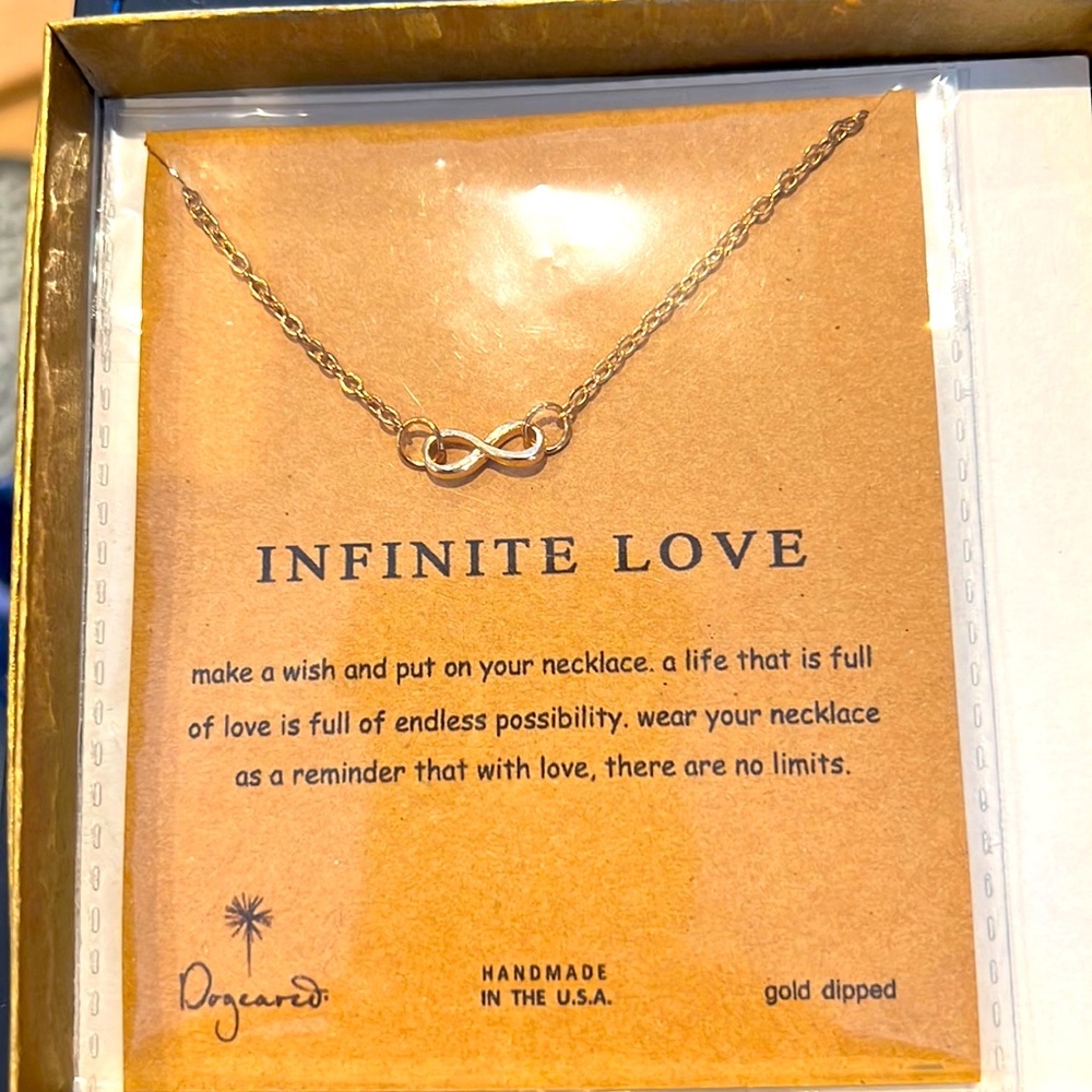 Infinite love necklace (infinity sign).  Gold dipped.  New in box.